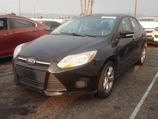 Photo 1 VIN: 1FADP3F23DL381361 - FORD FOCUS SE 