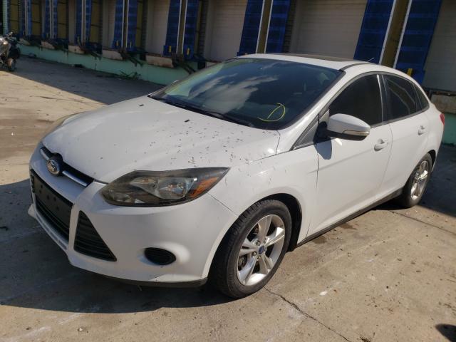 Photo 1 VIN: 1FADP3F23EL105103 - FORD FOCUS SE 