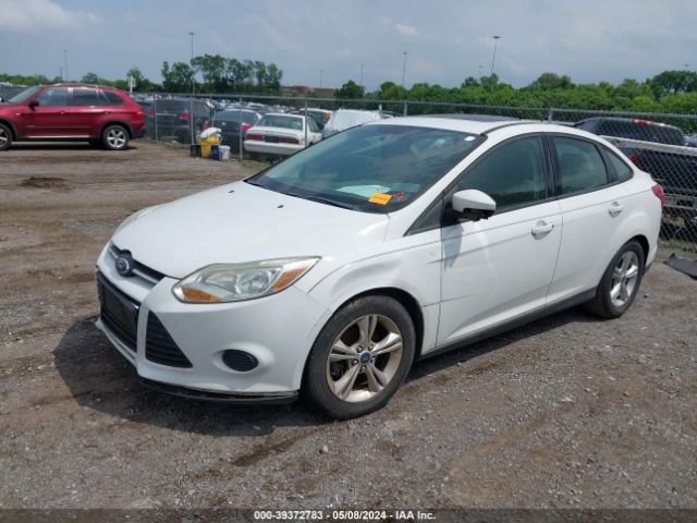 Photo 1 VIN: 1FADP3F23EL242218 - FORD FOCUS 