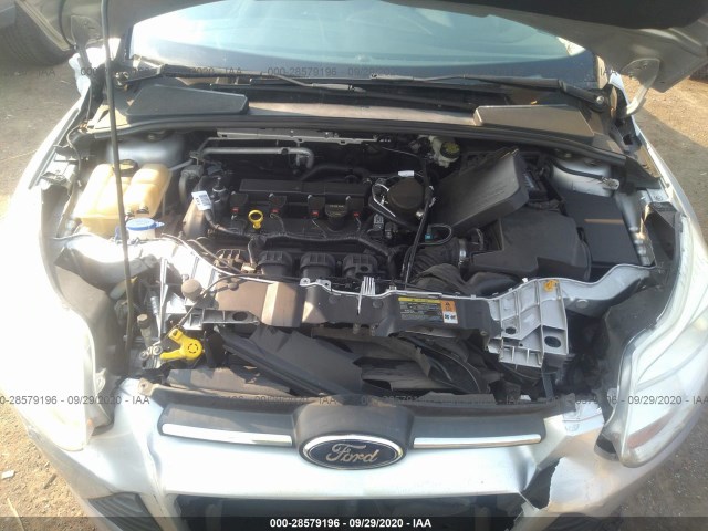 Photo 9 VIN: 1FADP3F23EL242302 - FORD FOCUS 