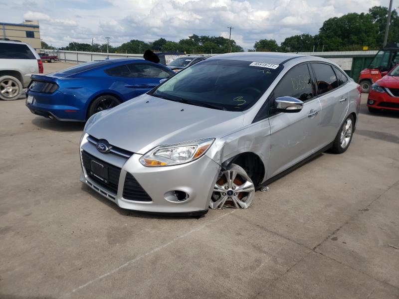 Photo 1 VIN: 1FADP3F23EL304586 - FORD FOCUS SE 