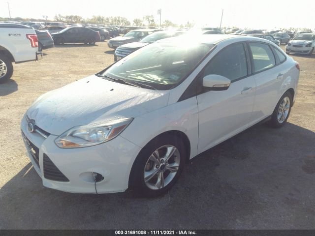 Photo 1 VIN: 1FADP3F23EL327947 - FORD FOCUS 