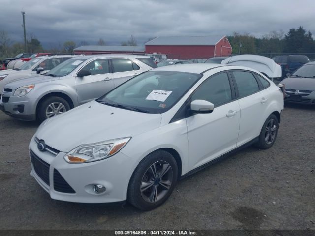 Photo 1 VIN: 1FADP3F23EL386271 - FORD FOCUS 