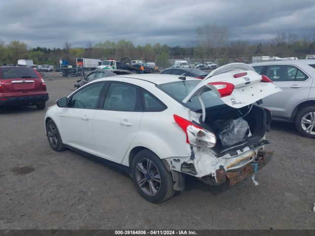 Photo 2 VIN: 1FADP3F23EL386271 - FORD FOCUS 