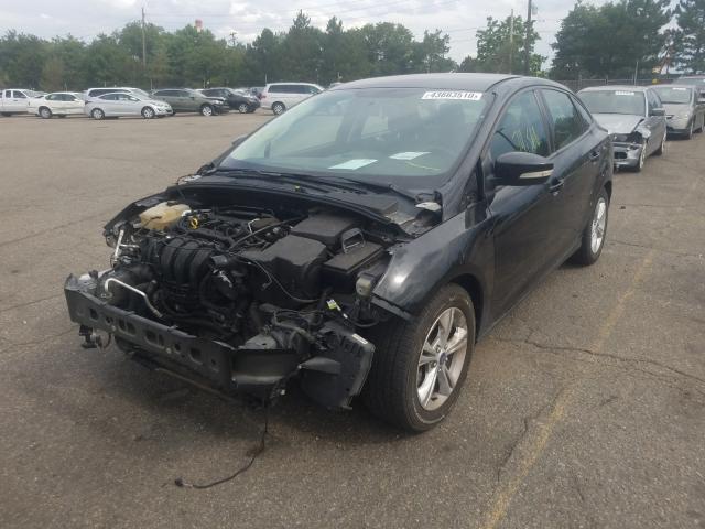 Photo 1 VIN: 1FADP3F23EL400430 - FORD FOCUS SE 