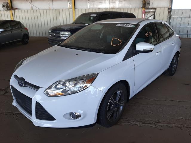 Photo 1 VIN: 1FADP3F23EL407488 - FORD FOCUS SE 