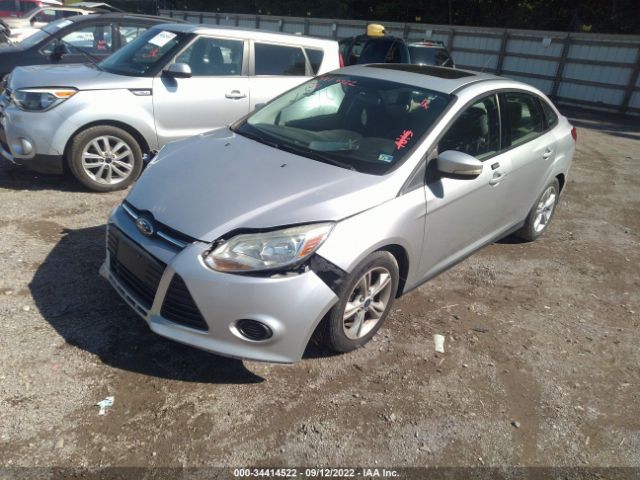 Photo 1 VIN: 1FADP3F23EL409967 - FORD FOCUS 