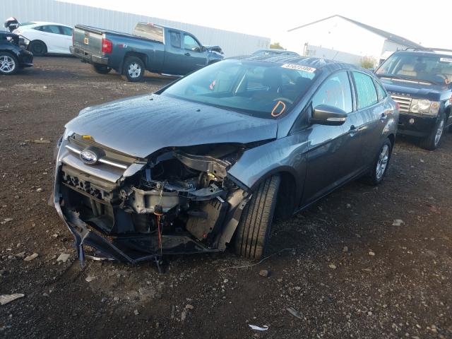 Photo 1 VIN: 1FADP3F23EL418300 - FORD FOCUS SE 