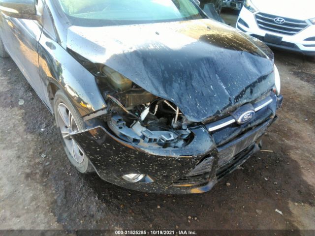 Photo 5 VIN: 1FADP3F23EL453631 - FORD FOCUS 