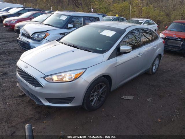 Photo 1 VIN: 1FADP3F23FL304962 - FORD FOCUS 