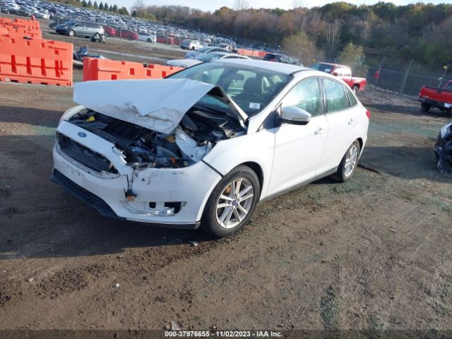 Photo 1 VIN: 1FADP3F23FL307912 - FORD FOCUS 