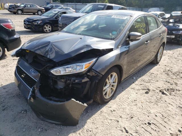 Photo 1 VIN: 1FADP3F23FL310549 - FORD FOCUS SE 