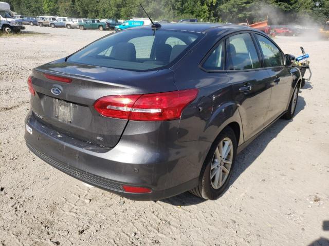 Photo 3 VIN: 1FADP3F23FL310549 - FORD FOCUS SE 