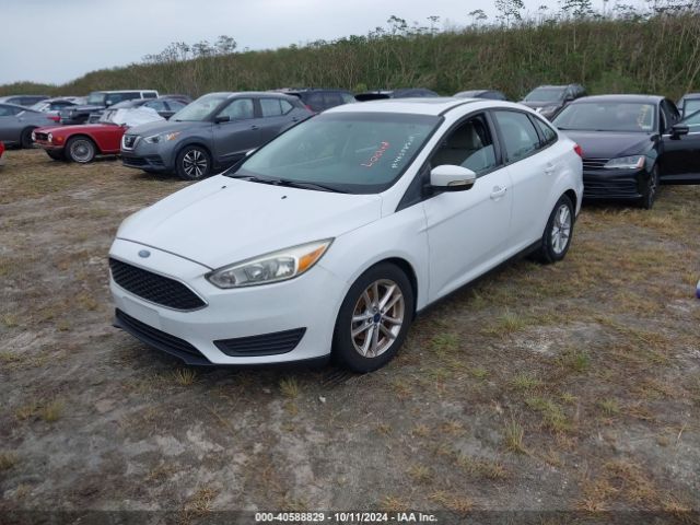 Photo 1 VIN: 1FADP3F23FL329375 - FORD FOCUS 