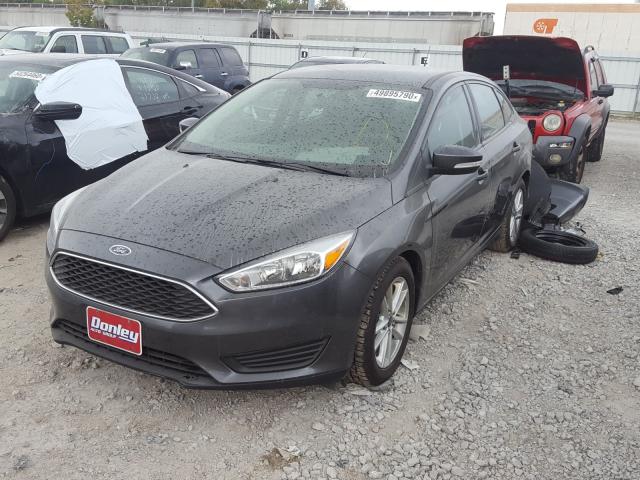 Photo 1 VIN: 1FADP3F23FL373425 - FORD FOCUS SE 