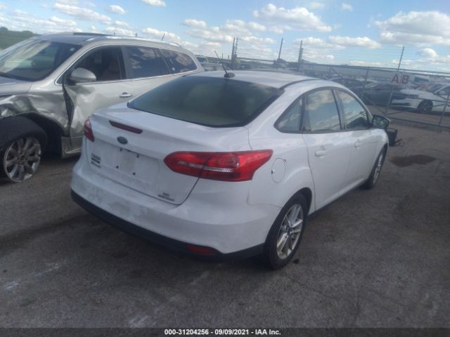 Photo 3 VIN: 1FADP3F23FL385204 - FORD FOCUS 