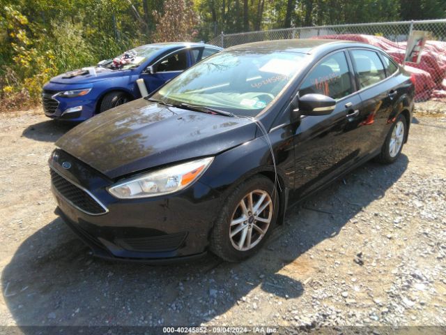 Photo 1 VIN: 1FADP3F23GL200635 - FORD FOCUS 