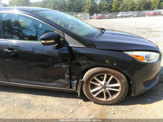 Photo 5 VIN: 1FADP3F23GL200635 - FORD FOCUS 