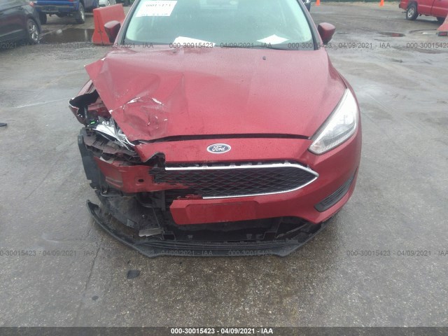 Photo 5 VIN: 1FADP3F23GL201610 - FORD FOCUS 