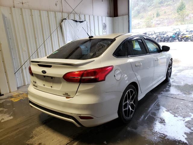 Photo 3 VIN: 1FADP3F23GL211876 - FORD FOCUS 