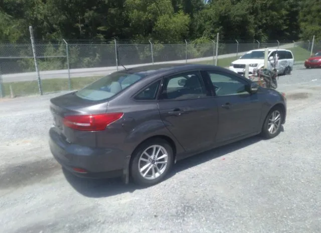 Photo 3 VIN: 1FADP3F23GL215717 - FORD FOCUS 