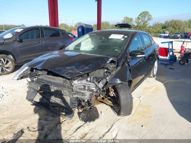 Photo 1 VIN: 1FADP3F23GL227981 - FORD FOCUS 