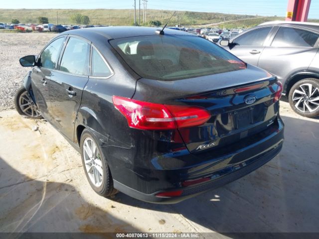 Photo 2 VIN: 1FADP3F23GL227981 - FORD FOCUS 