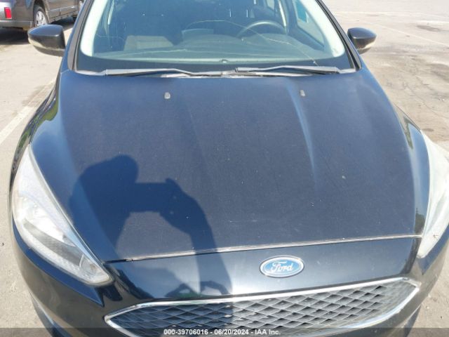 Photo 5 VIN: 1FADP3F23GL233652 - FORD FOCUS 