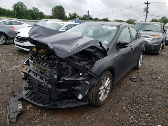 Photo 1 VIN: 1FADP3F23GL240424 - FORD FOCUS SE 