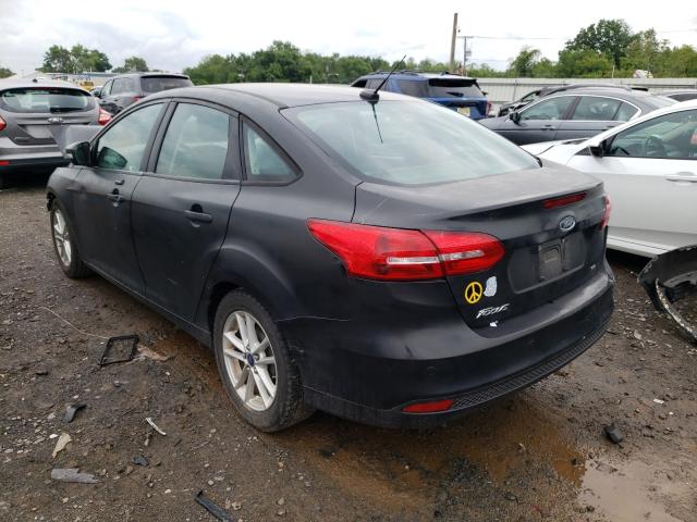 Photo 2 VIN: 1FADP3F23GL240424 - FORD FOCUS SE 