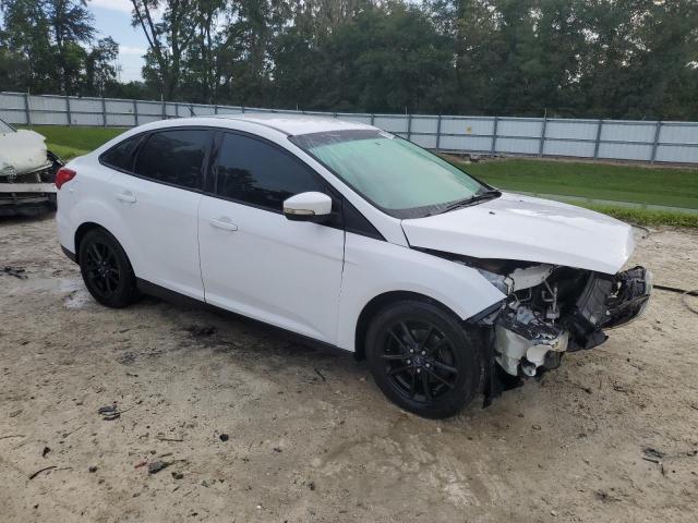 Photo 3 VIN: 1FADP3F23GL255487 - FORD FOCUS SE 