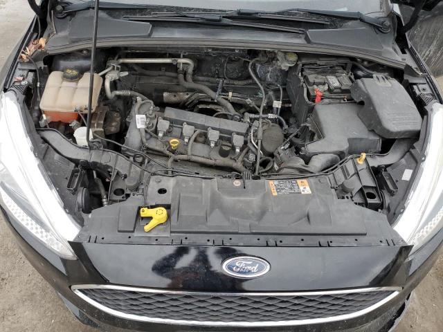 Photo 10 VIN: 1FADP3F23GL265906 - FORD FOCUS SE 