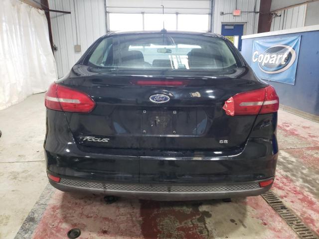 Photo 5 VIN: 1FADP3F23GL271494 - FORD FOCUS SE 