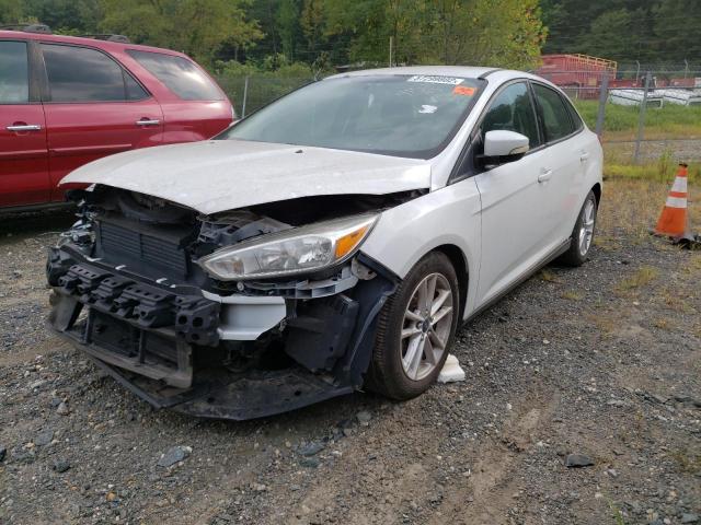 Photo 1 VIN: 1FADP3F23GL277215 - FORD FOCUS SE 