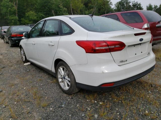 Photo 2 VIN: 1FADP3F23GL277215 - FORD FOCUS SE 