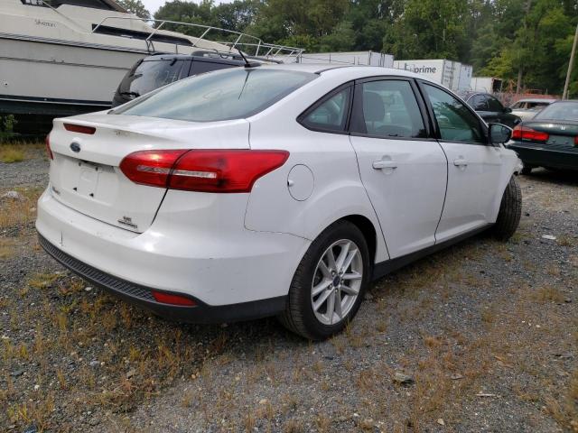 Photo 3 VIN: 1FADP3F23GL277215 - FORD FOCUS SE 