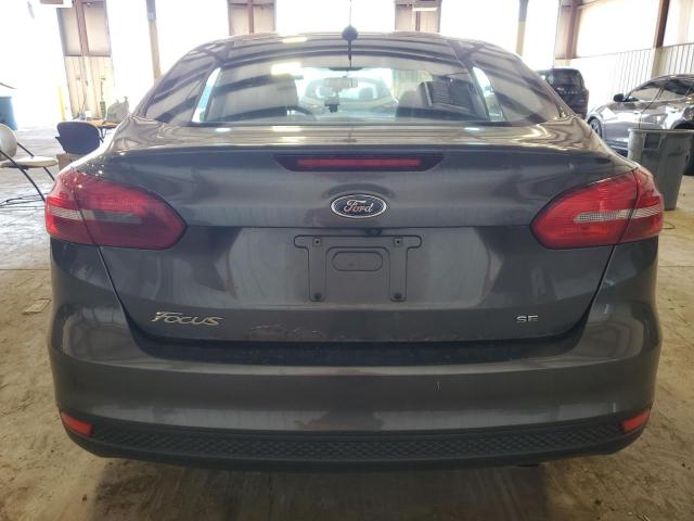 Photo 5 VIN: 1FADP3F23GL279076 - FORD FOCUS SE 