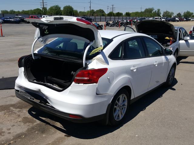 Photo 3 VIN: 1FADP3F23GL282852 - FORD FOCUS SE 