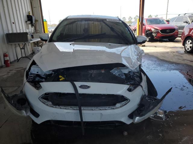 Photo 4 VIN: 1FADP3F23GL287923 - FORD FOCUS SE 