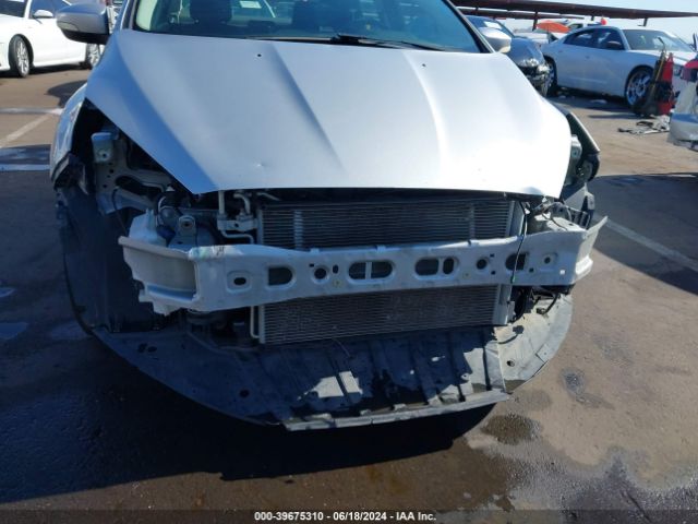 Photo 5 VIN: 1FADP3F23GL290112 - FORD FOCUS 