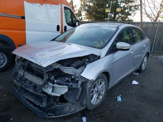 Photo 1 VIN: 1FADP3F23GL291325 - FORD FOCUS SE 