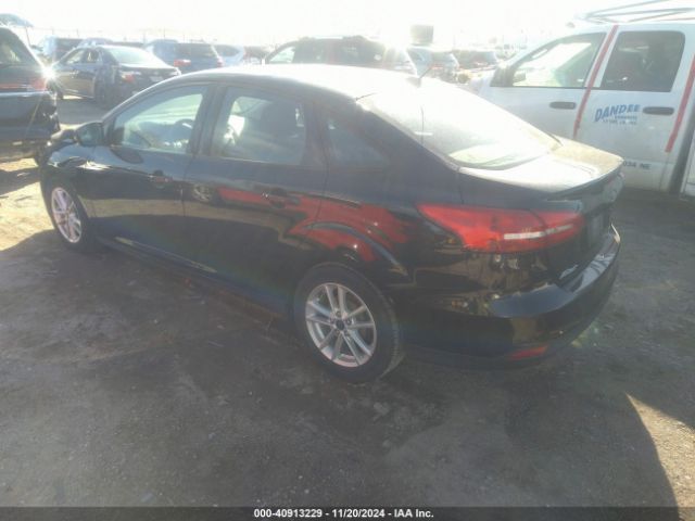 Photo 2 VIN: 1FADP3F23GL291499 - FORD FOCUS 