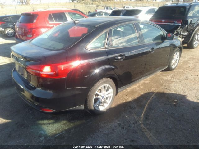 Photo 3 VIN: 1FADP3F23GL291499 - FORD FOCUS 