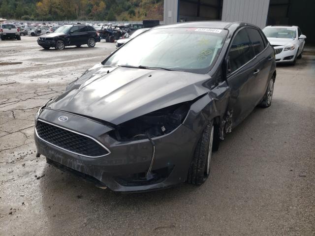 Photo 1 VIN: 1FADP3F23GL298260 - FORD FOCUS SE 