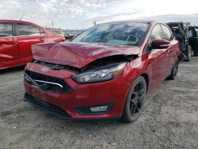 Photo 1 VIN: 1FADP3F23GL302422 - FORD FOCUS SE 