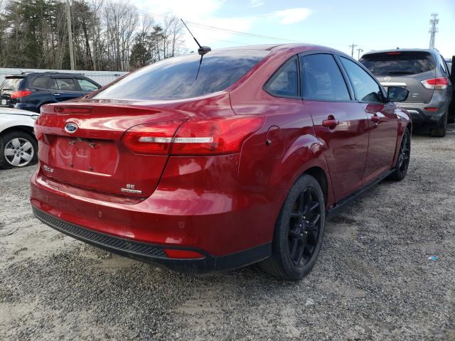 Photo 3 VIN: 1FADP3F23GL302422 - FORD FOCUS SE 