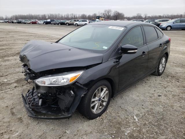 Photo 1 VIN: 1FADP3F23GL319088 - FORD FOCUS SE 