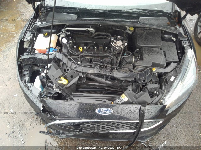 Photo 9 VIN: 1FADP3F23GL323450 - FORD FOCUS 