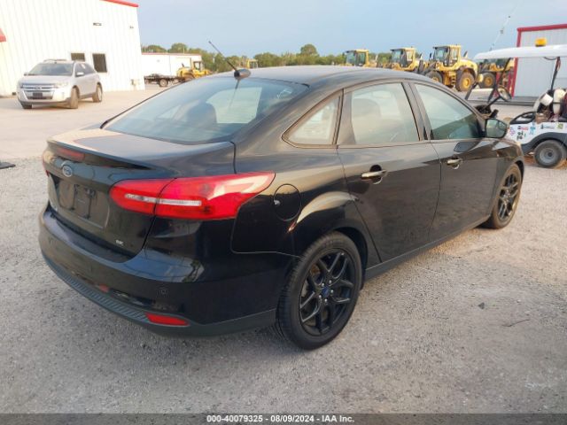 Photo 3 VIN: 1FADP3F23GL330284 - FORD FOCUS 