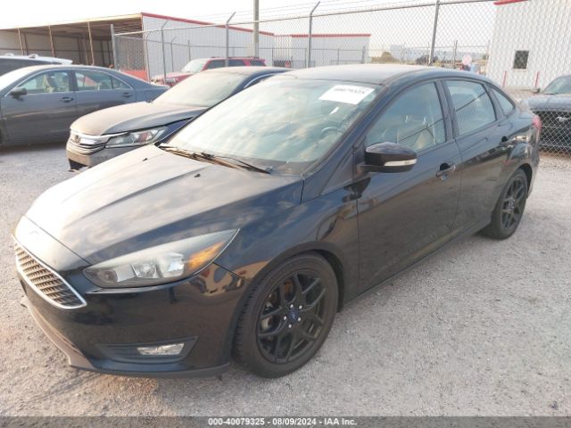 Photo 5 VIN: 1FADP3F23GL330284 - FORD FOCUS 